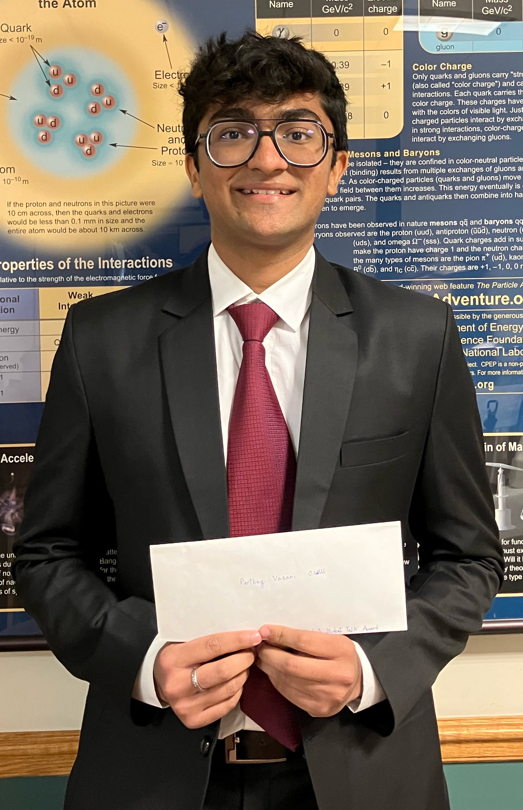 Parthey Vasani receiving an award